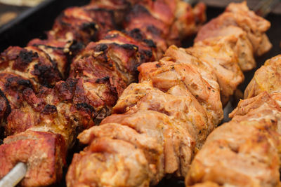 Close-up of meat on barbecue grill