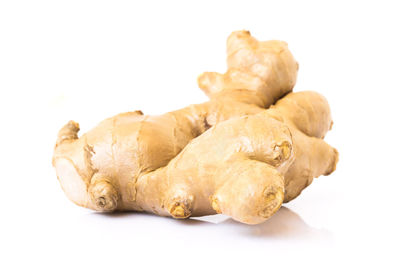 Close-up of bread against white background