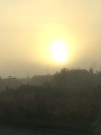 Scenic view of landscape against sky during sunset