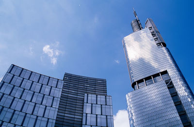 Low angle view of modern buildings against sky