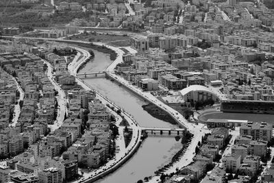 High angle view of road by buildings in city