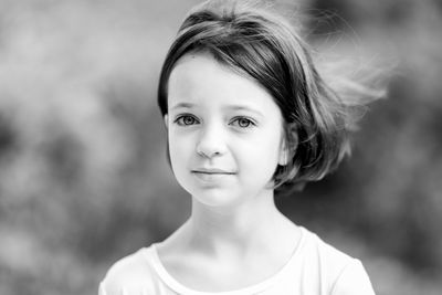 Portrait of cute girl outdoors