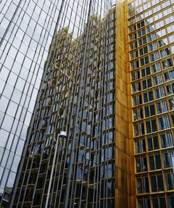 Low angle view of modern building against sky