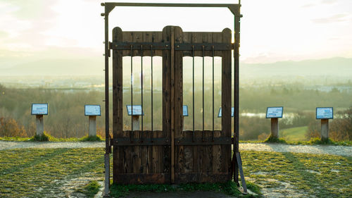 Built structure on field against sky