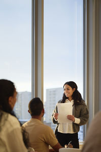 Businesswoman presenting during business seminar