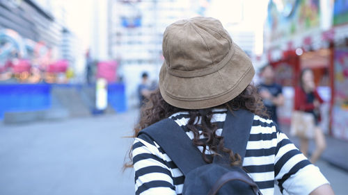 Rear view of woman on street