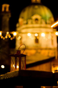 Low angle view of illuminated lights at night