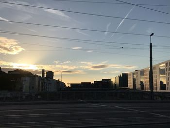 Buildings against sky during sunset