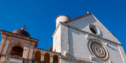 Low angle view of building against blue sky