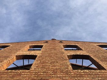 Low angle view of old building against sky
