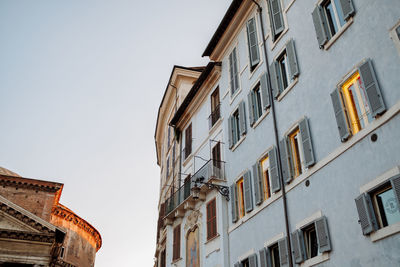 Low angle view of residential building against clear sky