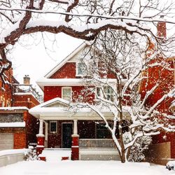 Houses on snow covered landscape