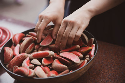 Midsection of woman holding food