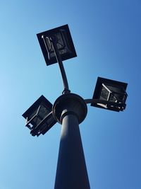 Low angle view of street light against clear sky