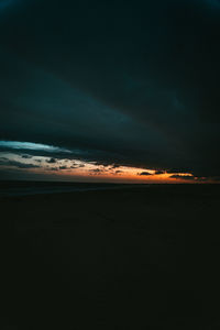 Scenic view of dramatic sky over land