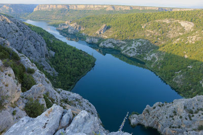 High angle view of lake and rocks