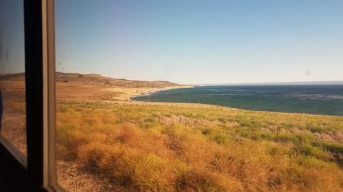 Scenic view of sea against clear sky