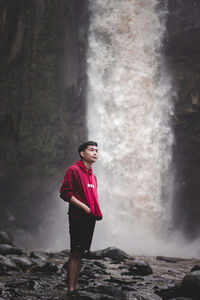 Waterfall and woman