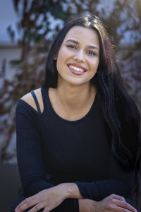 Portrait of smiling woman outdoors