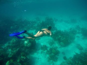 Woman snorkeling in sea