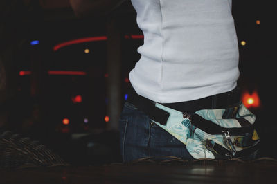 Rear view of man standing in restaurant