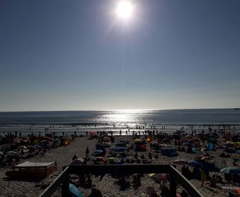 Scenic view of sea against clear sky on sunny day