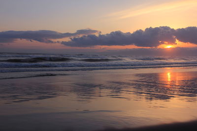 Scenic view of sea at sunset