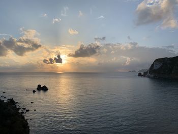 Scenic view of sea against sky during sunset