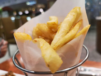 Close-up of fries in plate on table