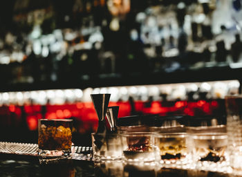 View of nightclub beer bar with alcoholic bottles stacked on shelf