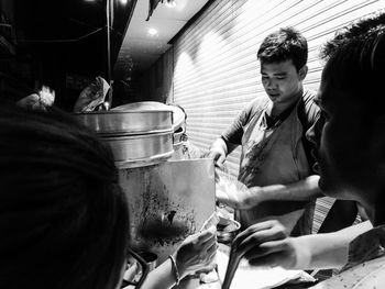 Midsection of woman preparing food