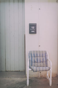 Empty chair outside house