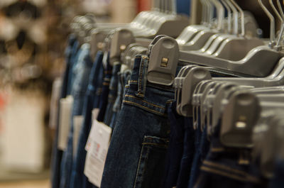 Close-up of jeans in store