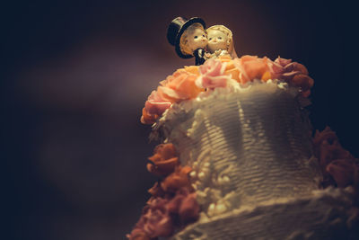 Close-up of a hand holding ice cream