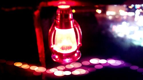 Close-up of lit candle