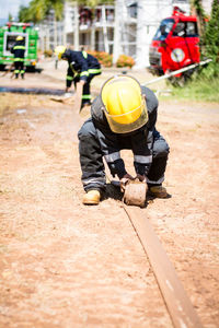 Firefighters working on ground