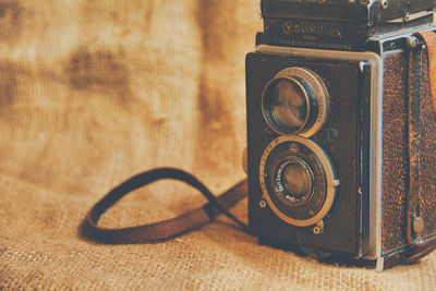 Close-up of camera on table