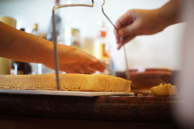 Close-up of person preparing food