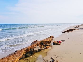 Scenic view of beach against sky