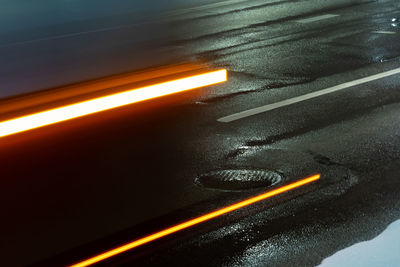 High angle view of illuminated road seen through window