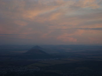 Scenic view of landscape against sky during sunset