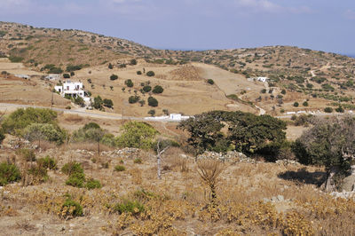 Scenic view of landscape and mountains against sky