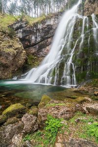 View of waterfall in forest