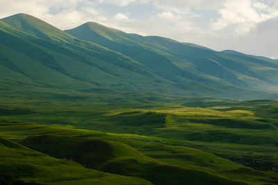 Scenic view of mountains against sky