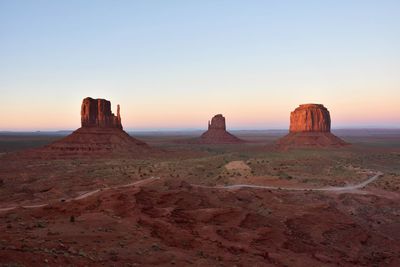 Rock formation in desert against sky