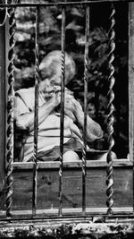 Metal grate in cage at zoo