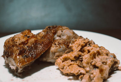 Close-up of bread in plate on table