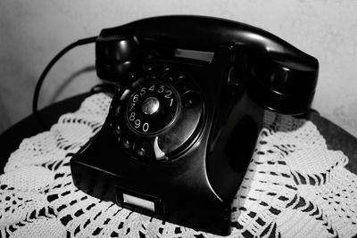 High angle view of telephone on table