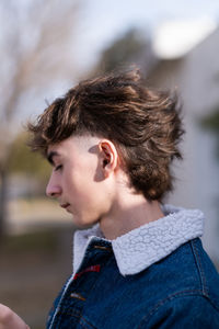 Sunset portrait of handsome teenager boy