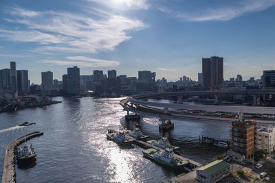 High angle view of buildings in city against sky